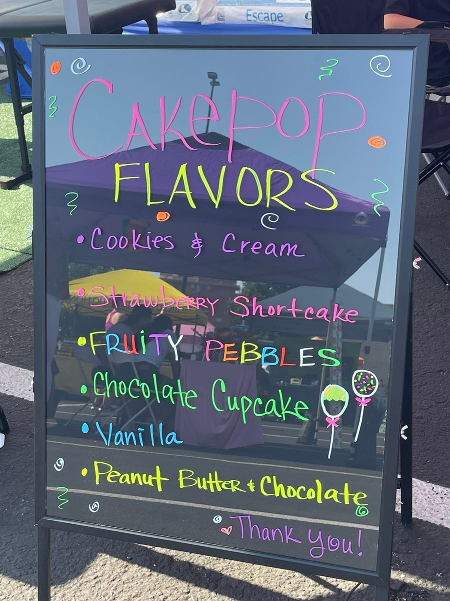 Cakepop flavors chalkboard sign at the market
