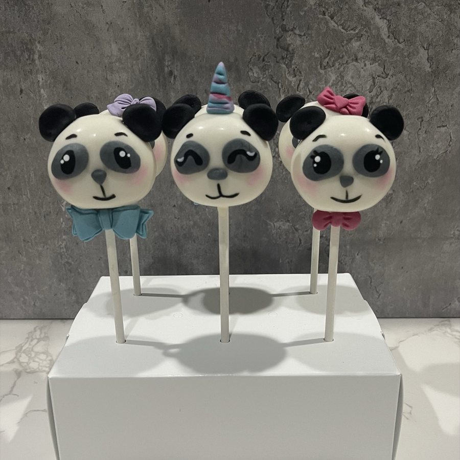 Panda and unicorn character cake pops with bows