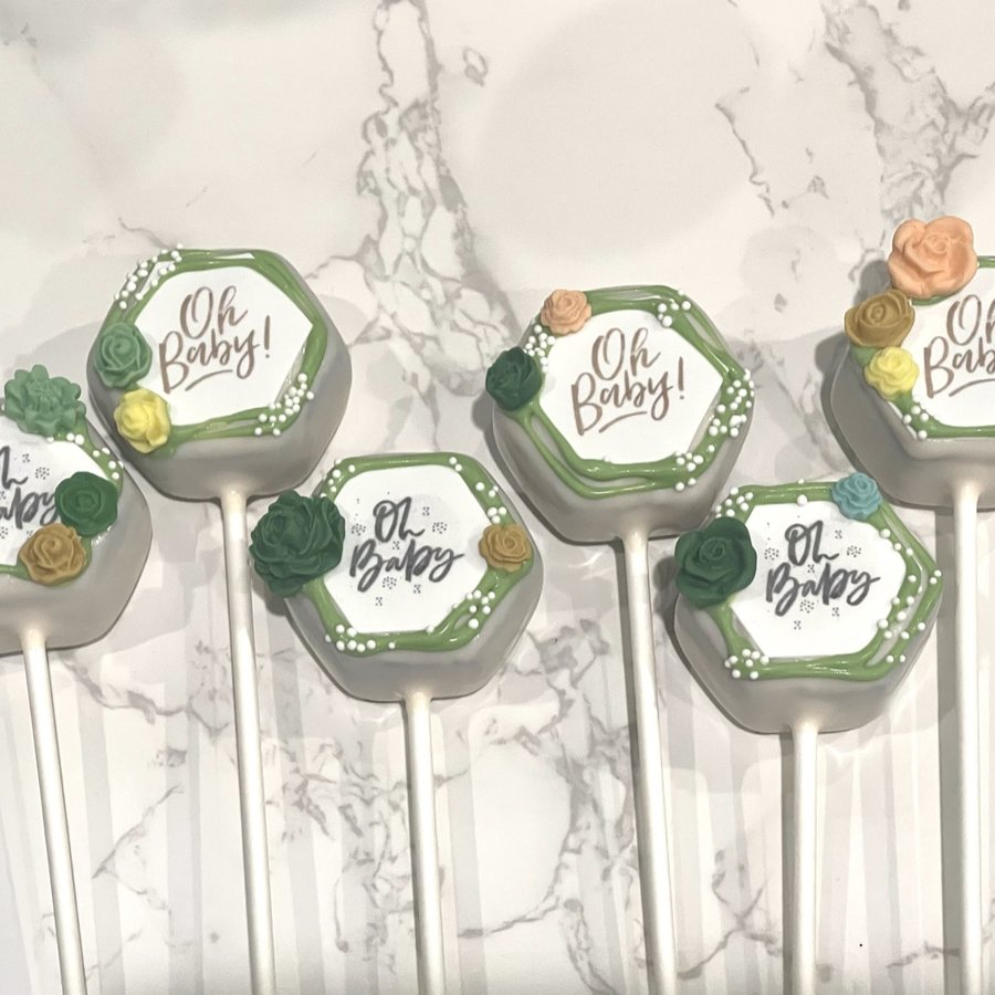 Sage green 'Oh Baby' baby shower cake pops with sugar roses